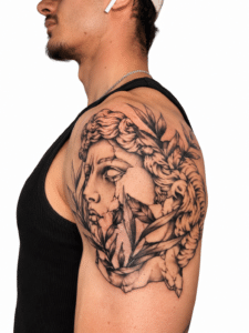 Black and grey Greek statue shoulder tattoo by Anderson, Perth