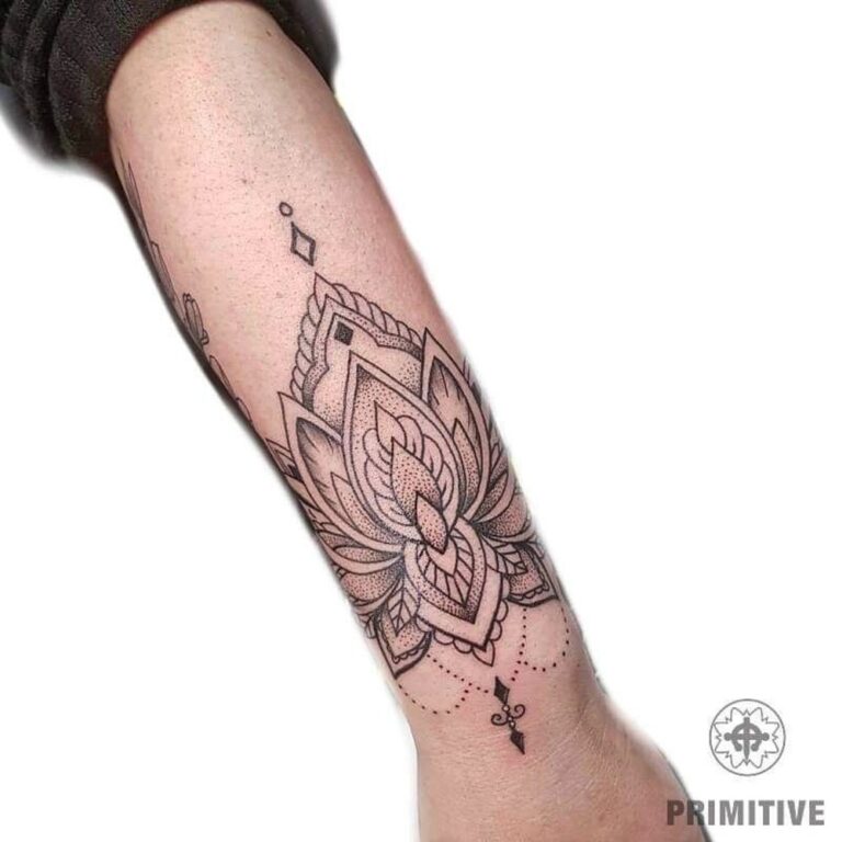Fine line lotus mandala forearm tattoo